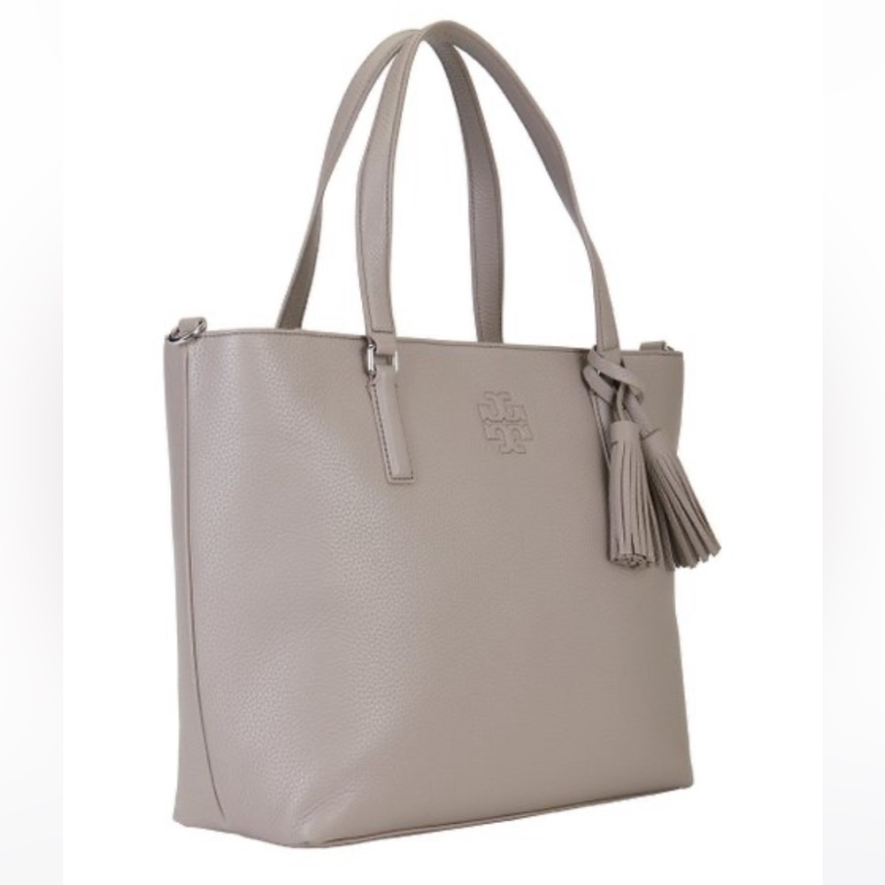 Tory Burch Thea tote. It’s just larger  than I needed. In excellent condition